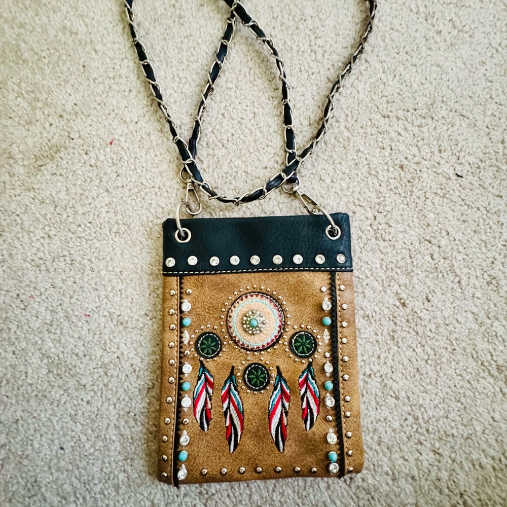 Tan and Black Crossbody Bag with Decorative Tassels